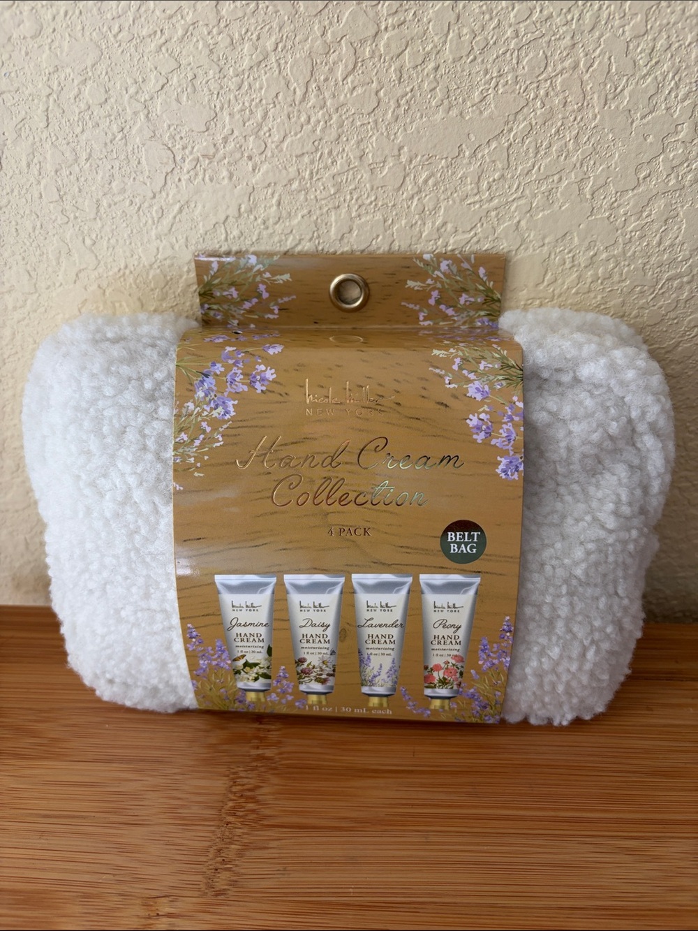 Nicole Miller New York belt bag with 4 pack lotion bundle
